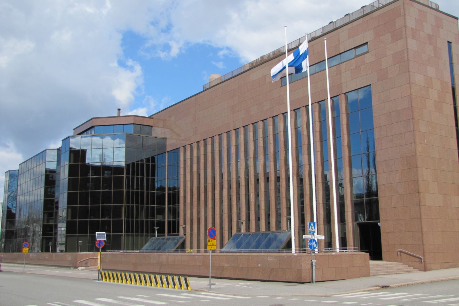Office building at Itälahdenkatu 15-17, Helsinki, with the Finnish flag